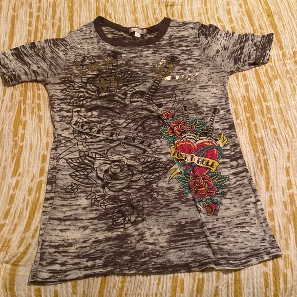 Romeo & Juliet Couture Tops - Rock n out fun top!